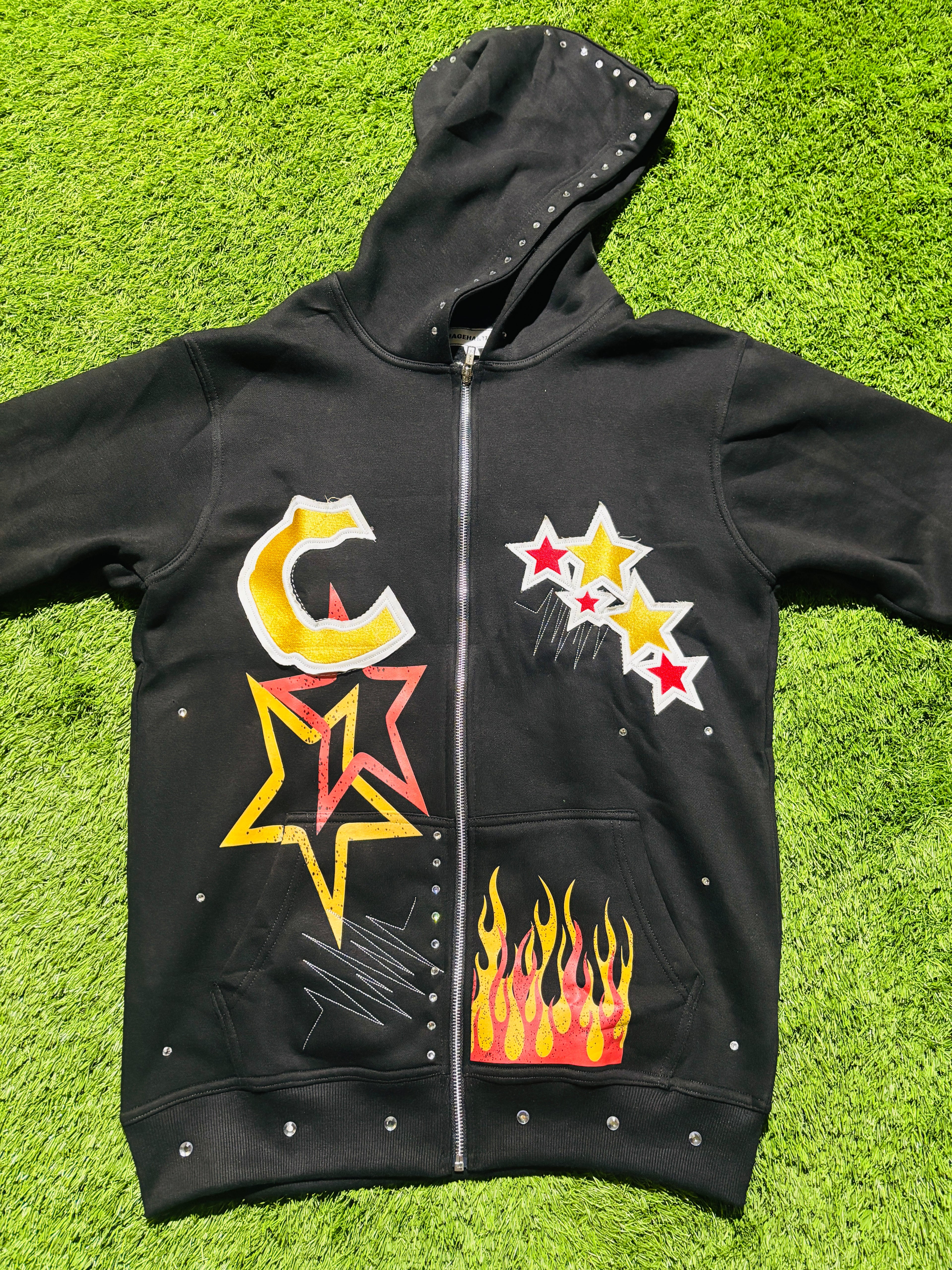 Base Black, with  Red & Yellow star designed jacket