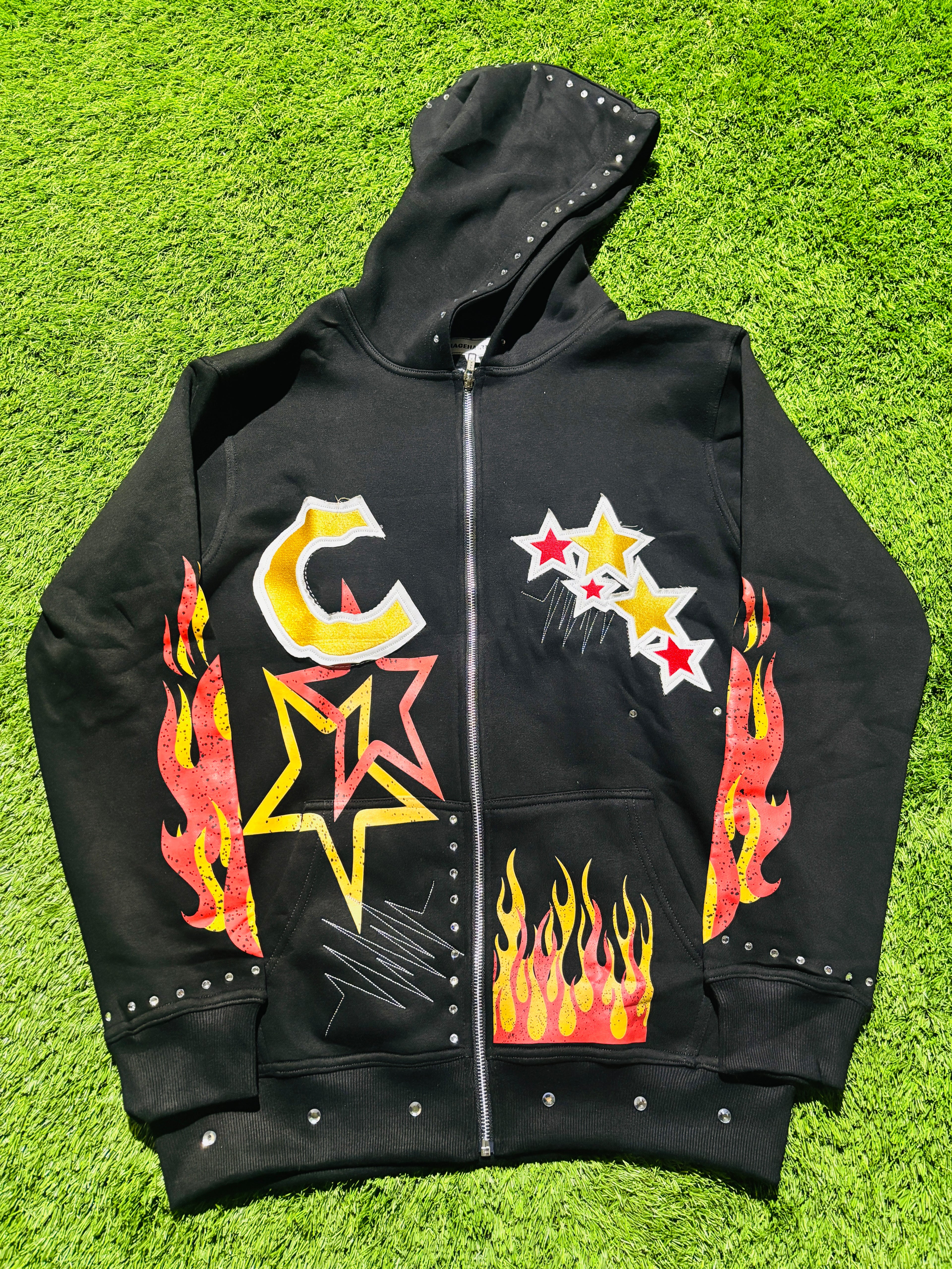 Base Black, with  Red & Yellow star designed jacket