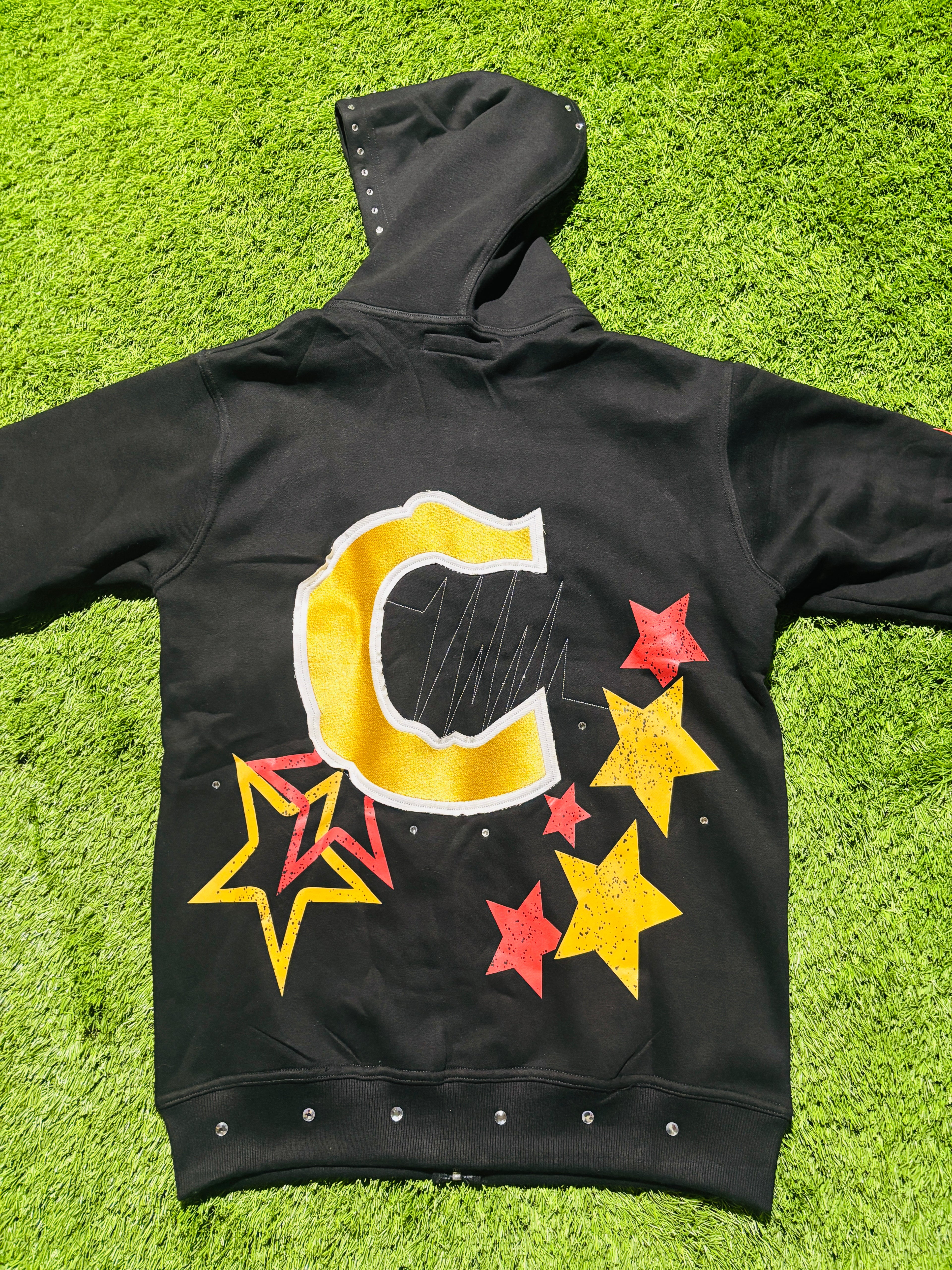 Base Black, with  Red & Yellow star designed jacket