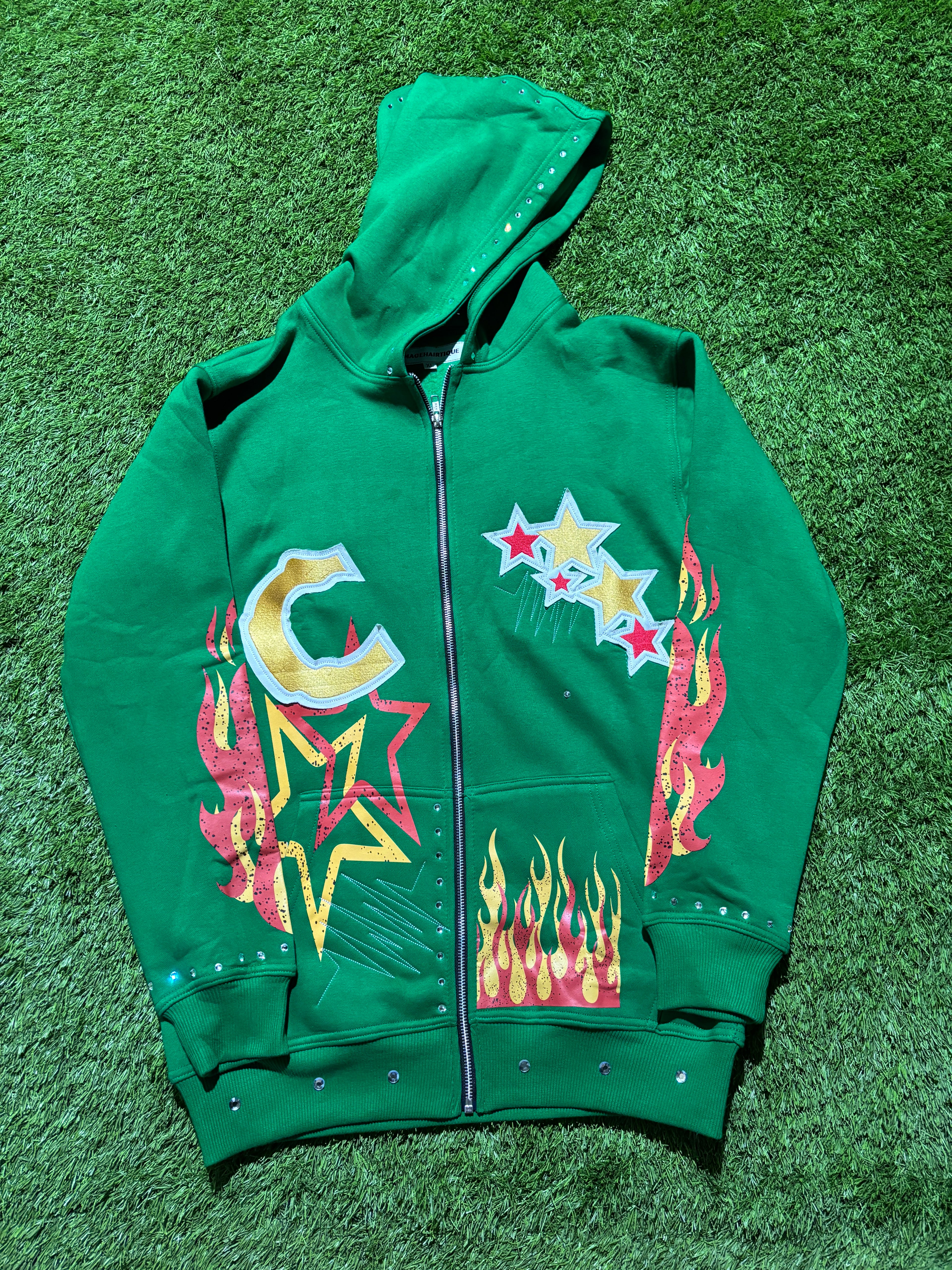 Base Green, with  Red & Yellow star designed jacket