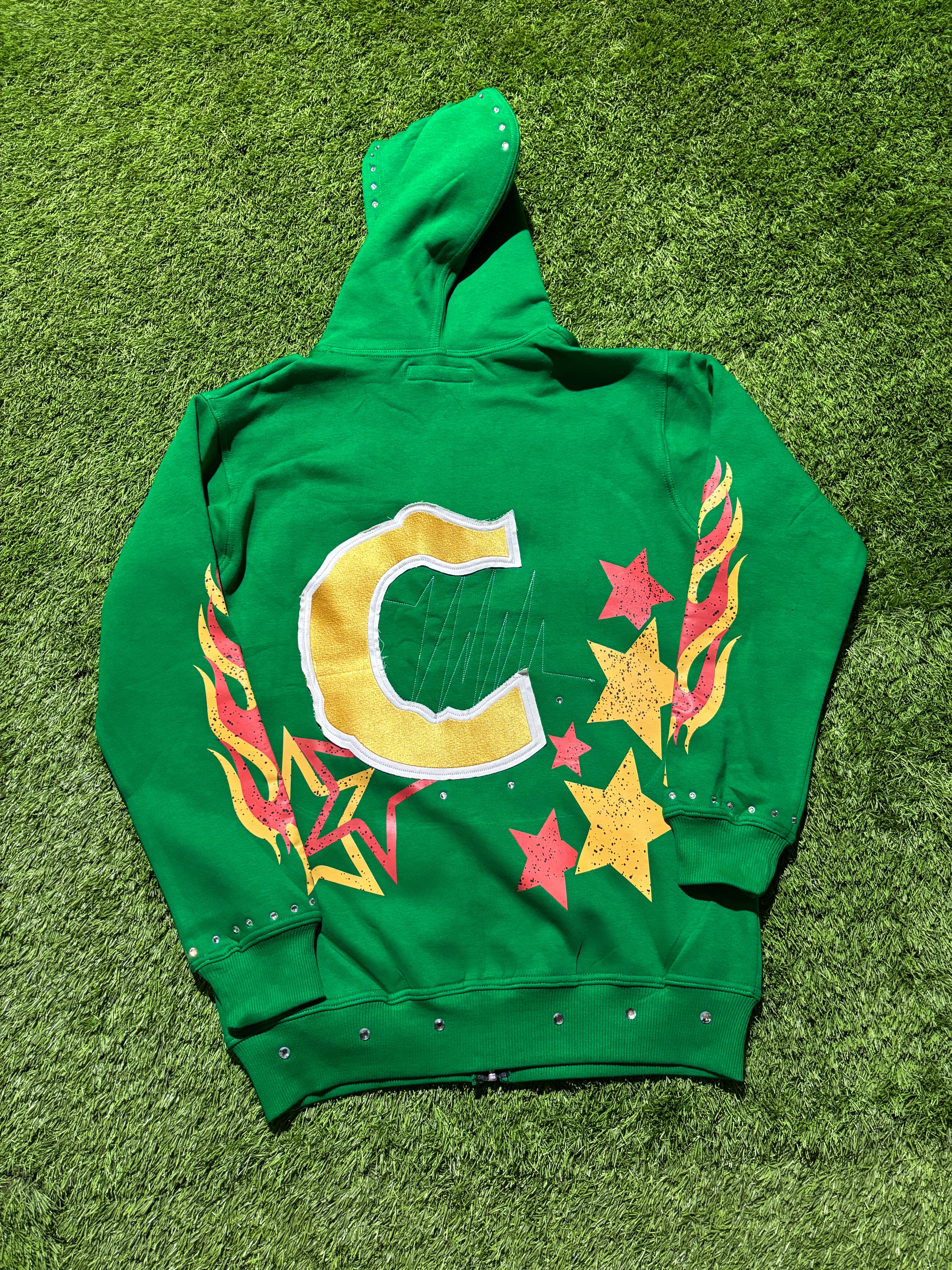 Base Green, with  Red & Yellow star designed jacket