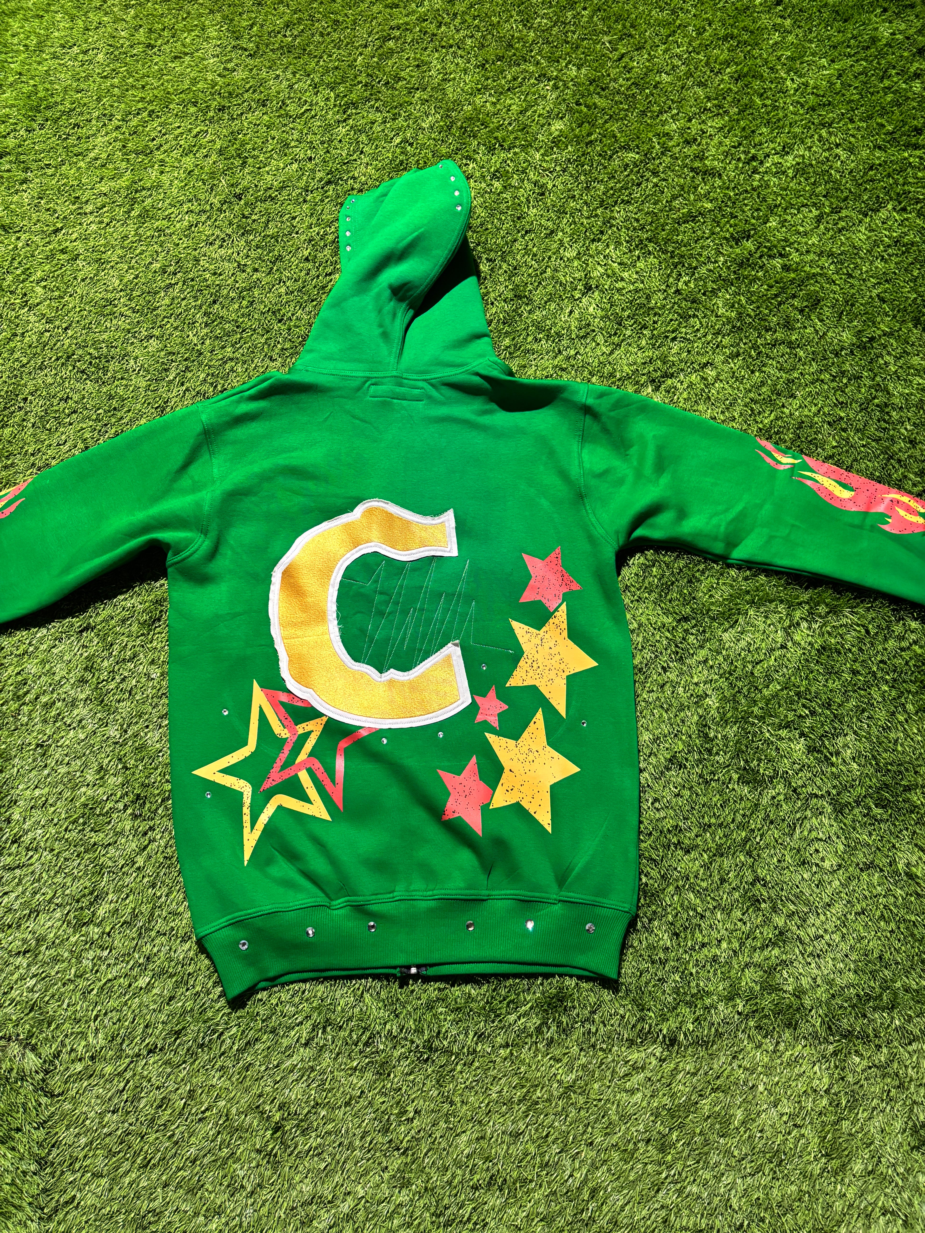 Base Green, with  Red & Yellow star designed jacket