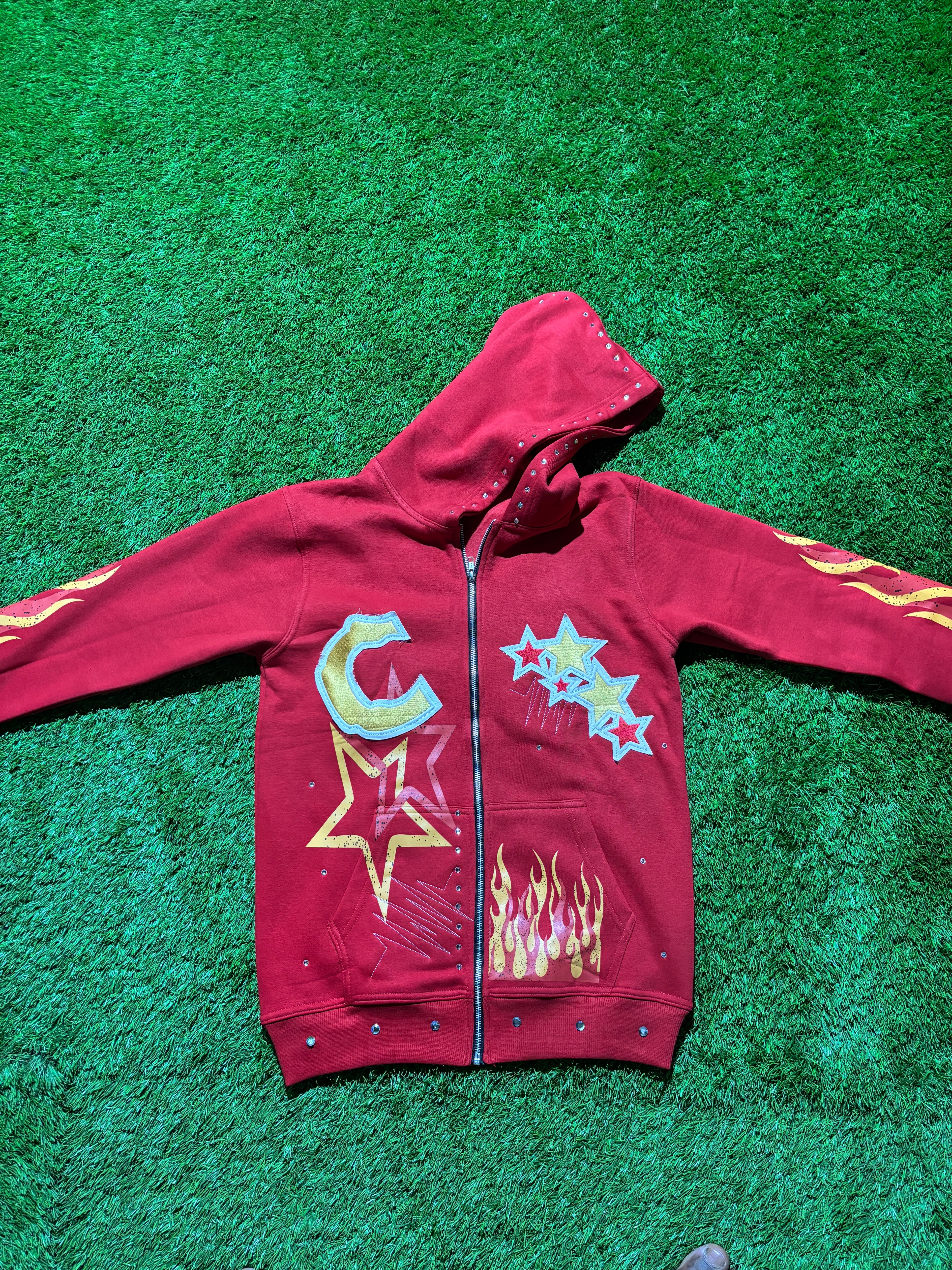 Base Red, with  Red & Yellow star designed jacket
