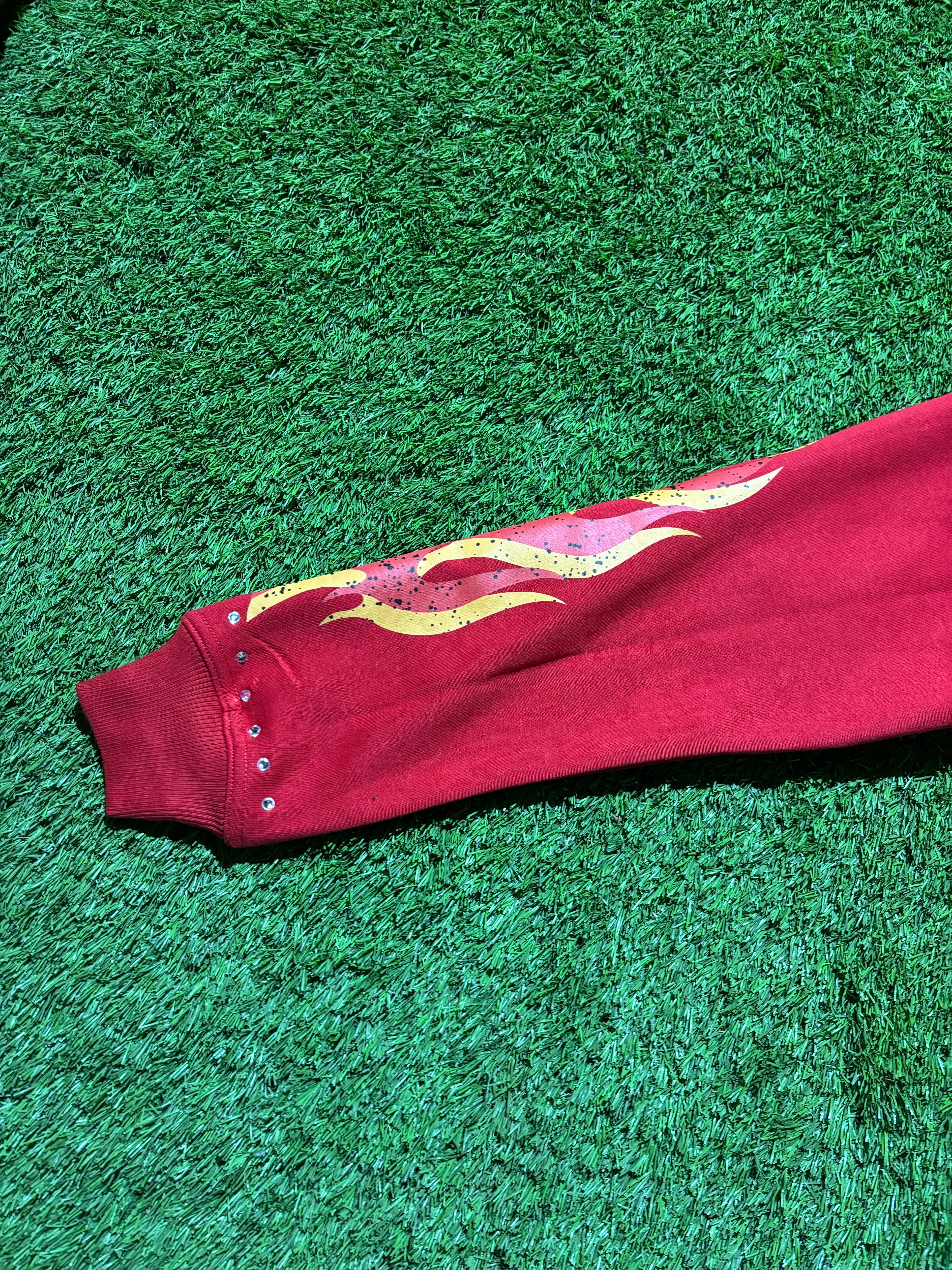 Base Red, with  Red & Yellow star designed jacket