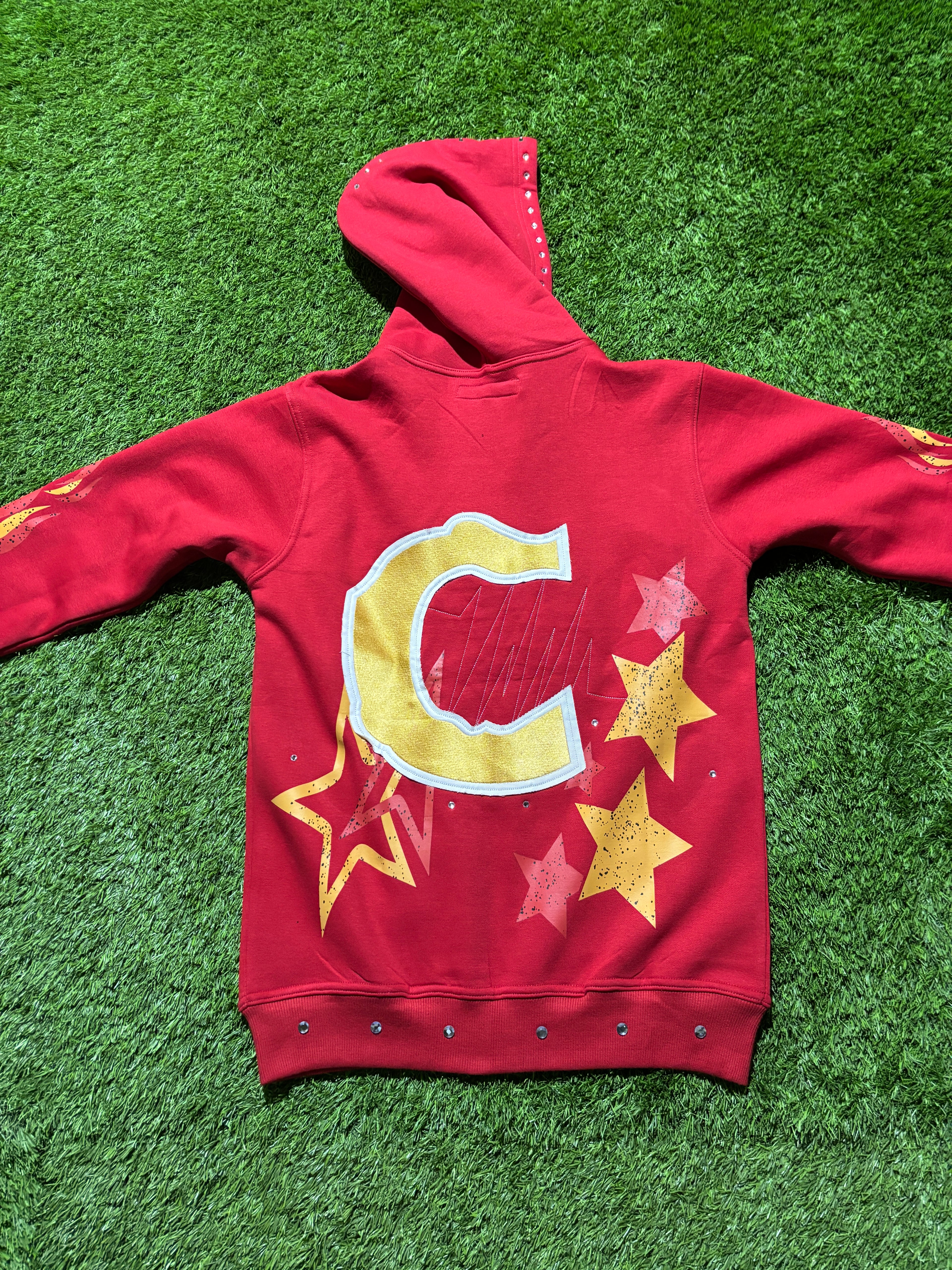 Base Red, with  Red & Yellow star designed jacket