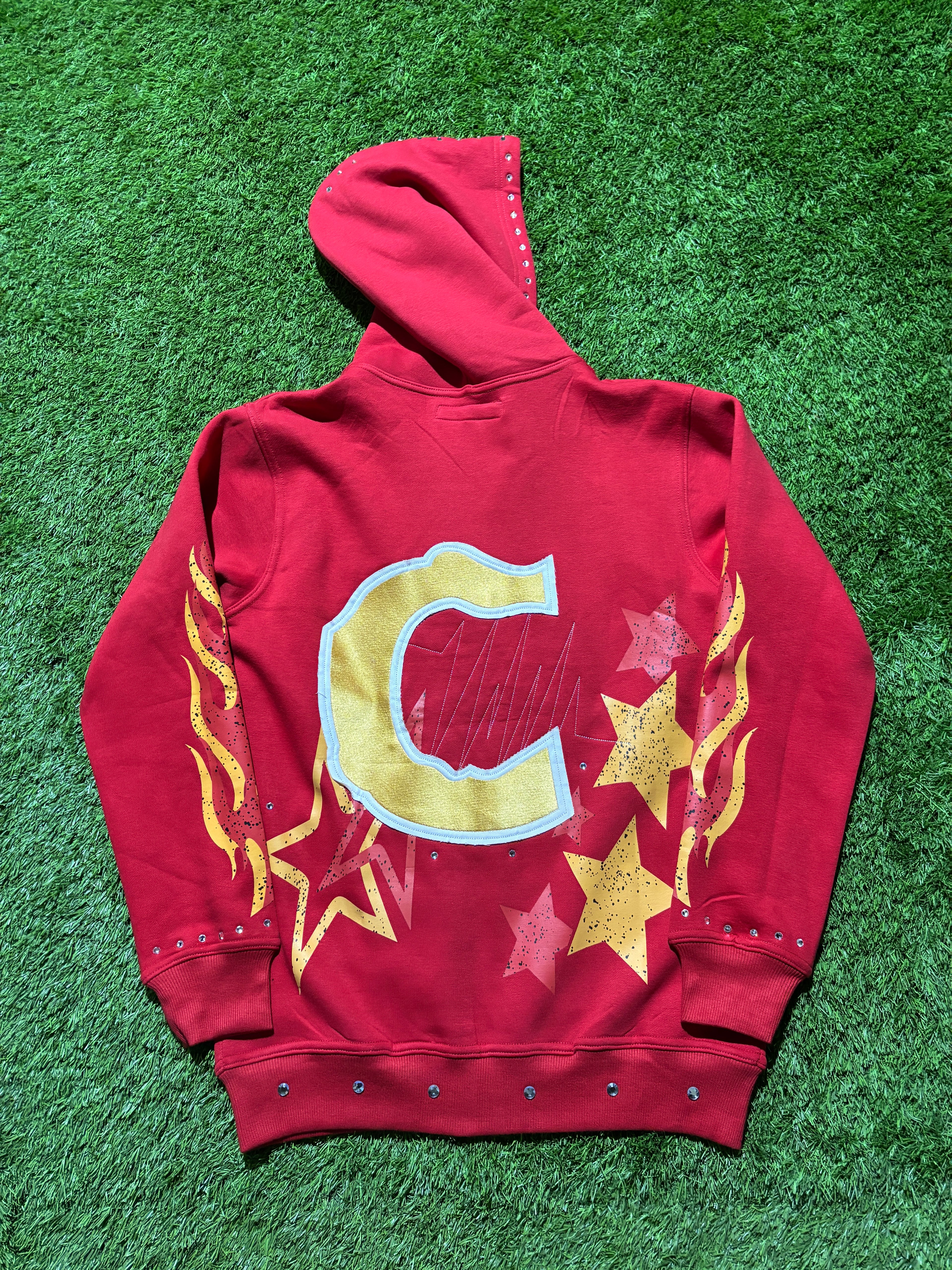 Base Red, with  Red & Yellow star designed jacket
